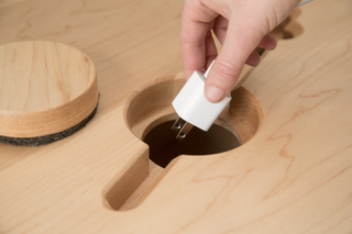 Illustration for article titled This Desk Keeps Your Cords In Order and Has a Built-In Whiteboard